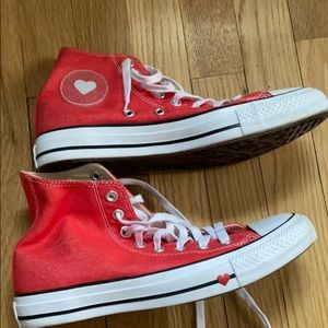 Red hightop converse , with hearts